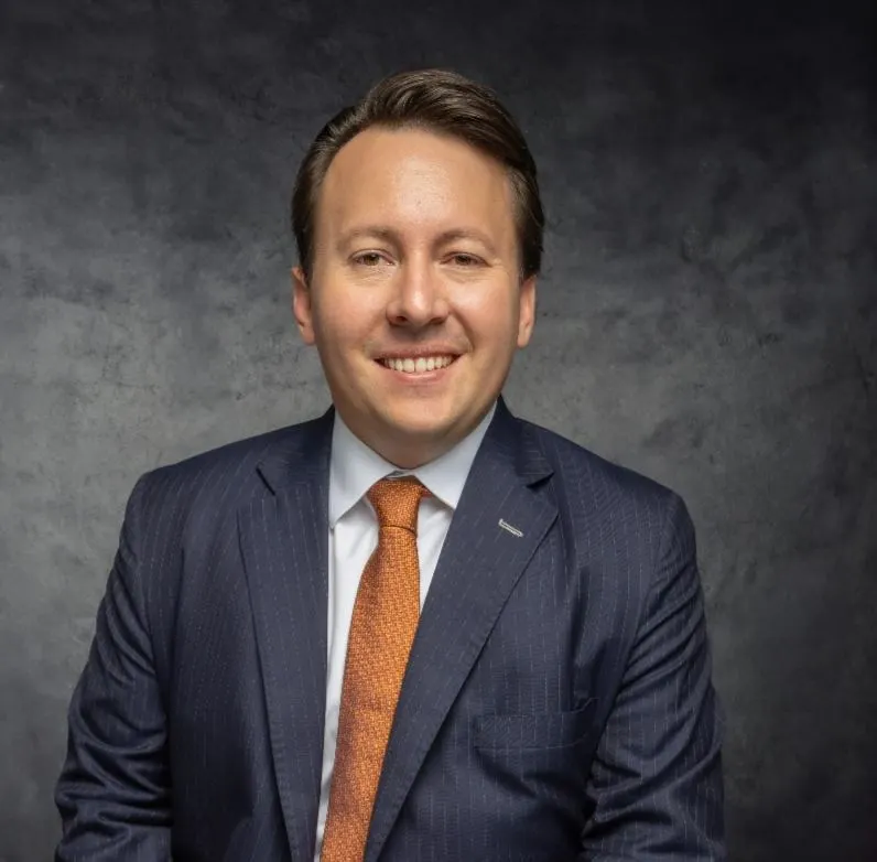 Dr. Ben Rust, fundador e advogado da Ben Rust Law